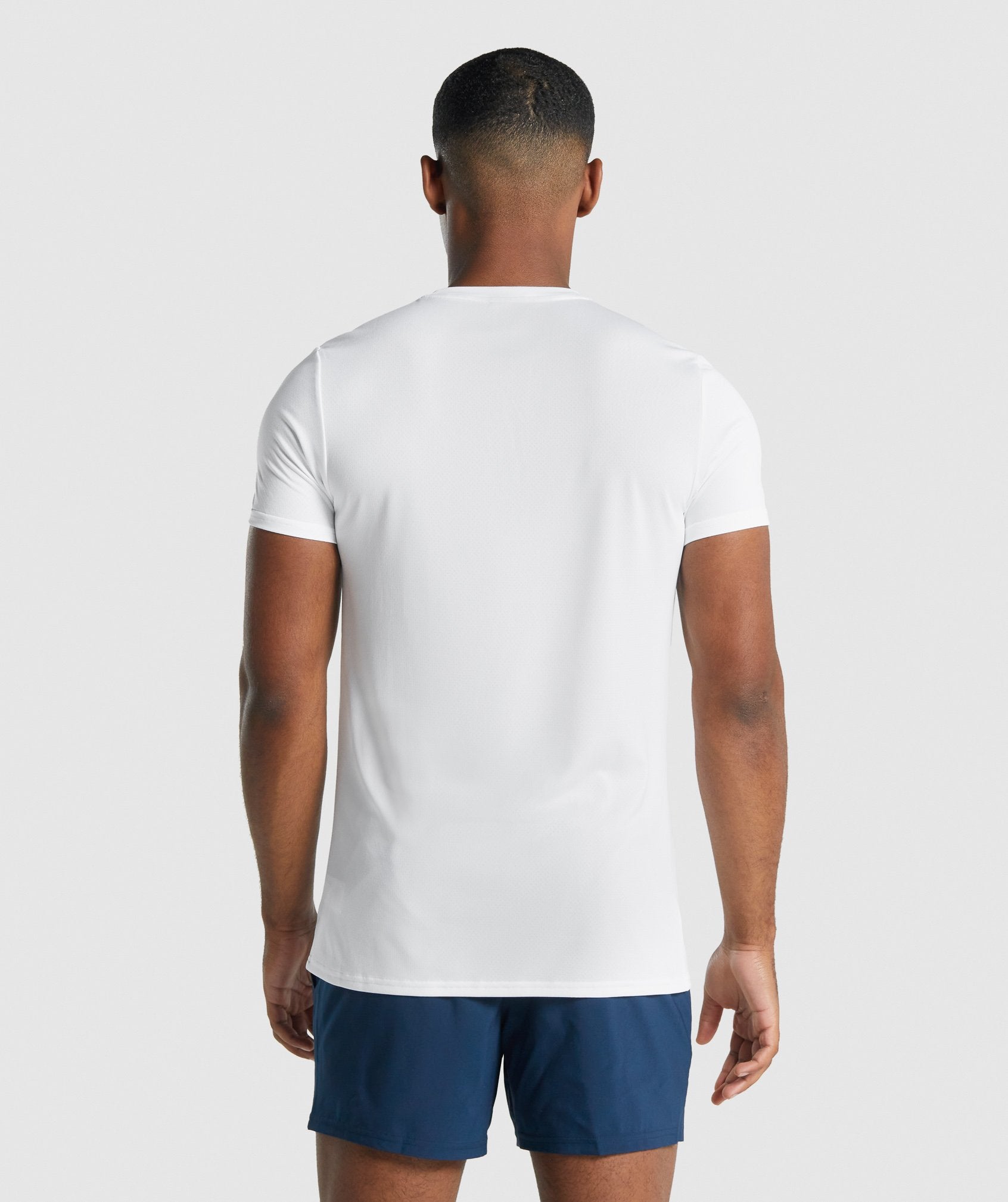 Camiseta Gymshark Arrival Estampadas Hombre Blancas | 6127583-LQ