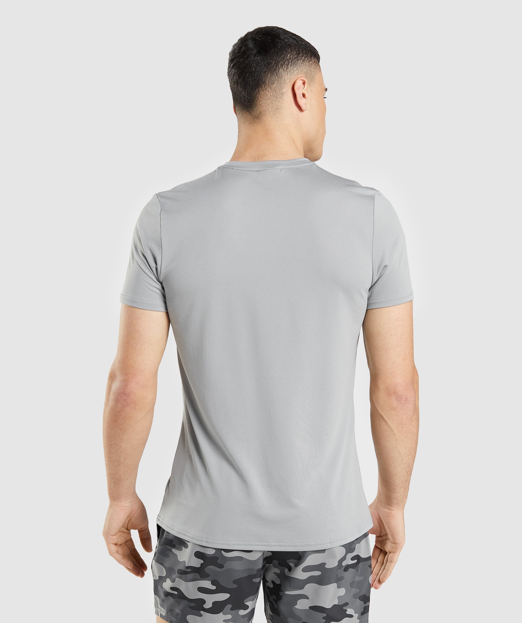 Camiseta Gymshark Arrival Estampadas Hombre Gris | 8320467-HE