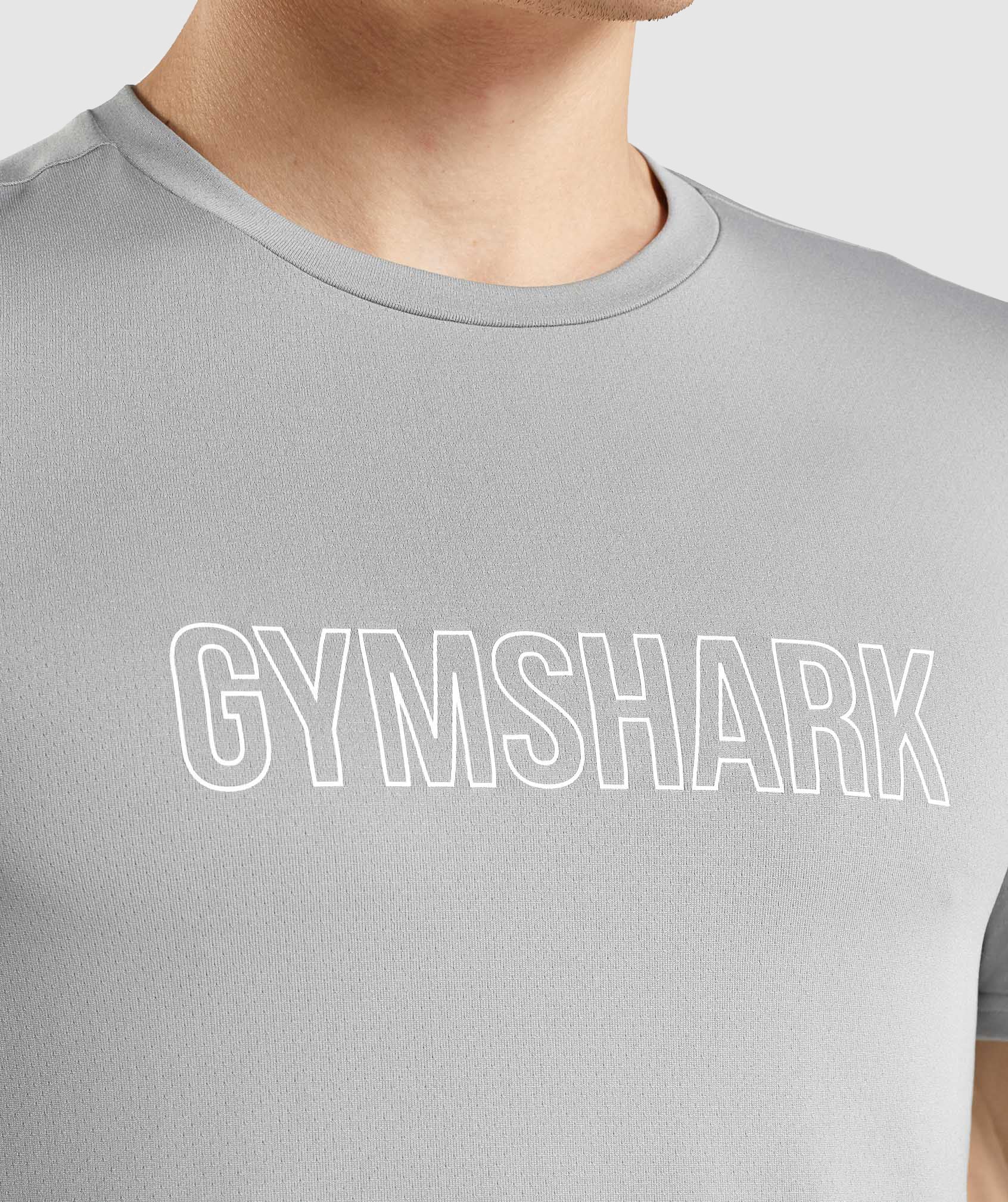 Camiseta Gymshark Arrival Estampadas Hombre Gris | 8320467-HE