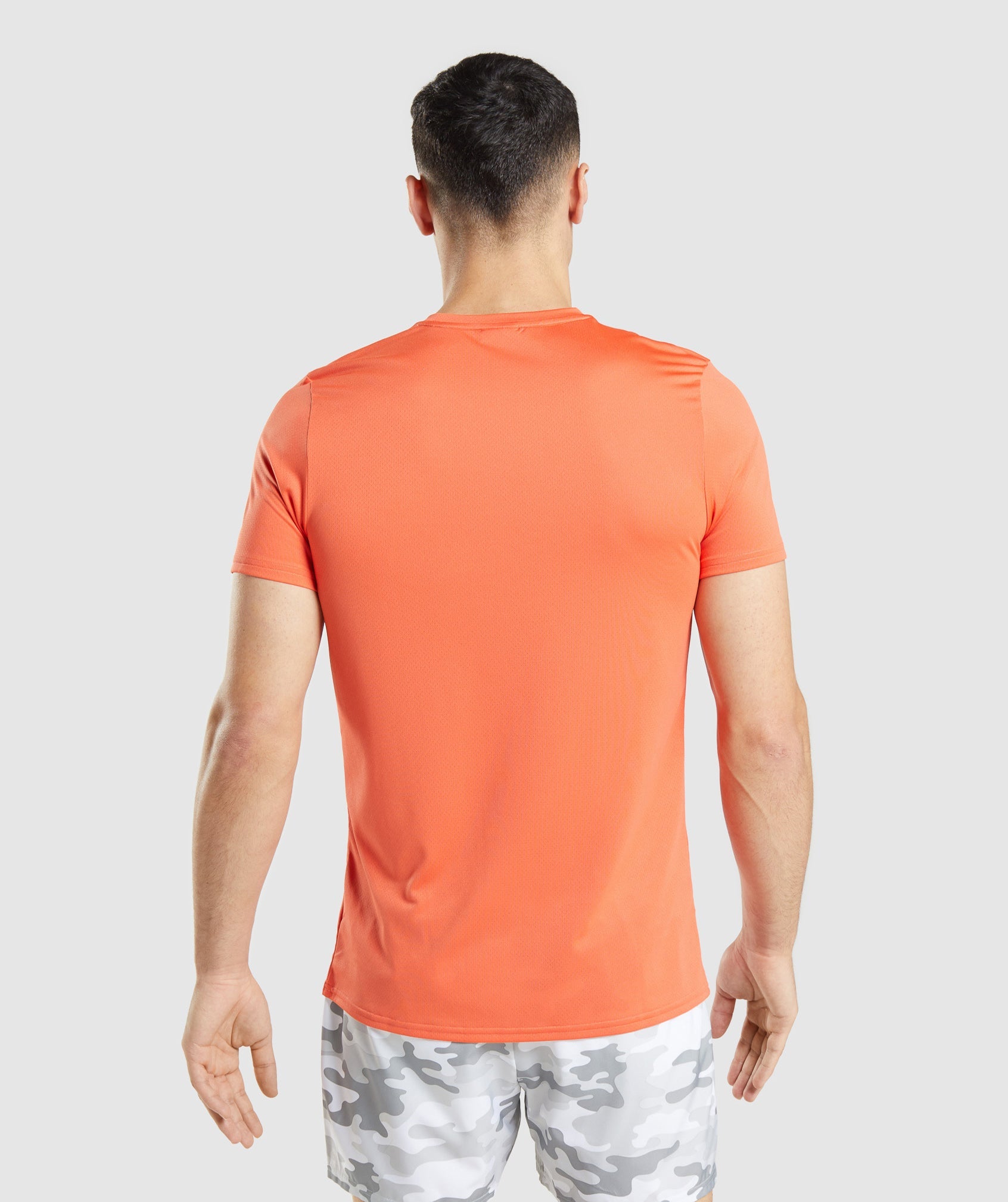 Camiseta Gymshark Arrival Estampadas Hombre Naranjas | 9253146-EM