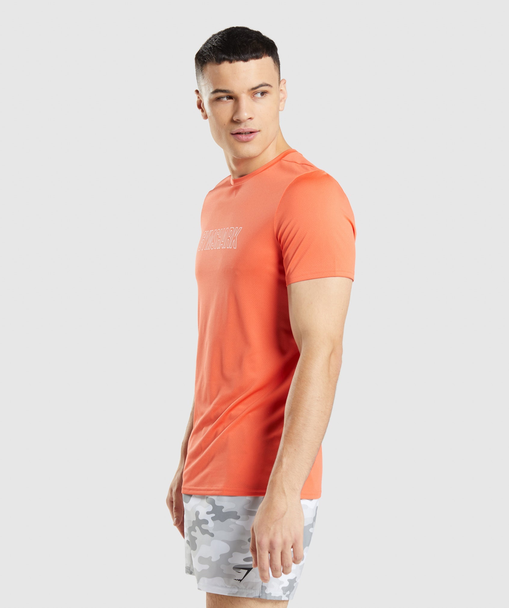 Camiseta Gymshark Arrival Estampadas Hombre Naranjas | 9253146-EM