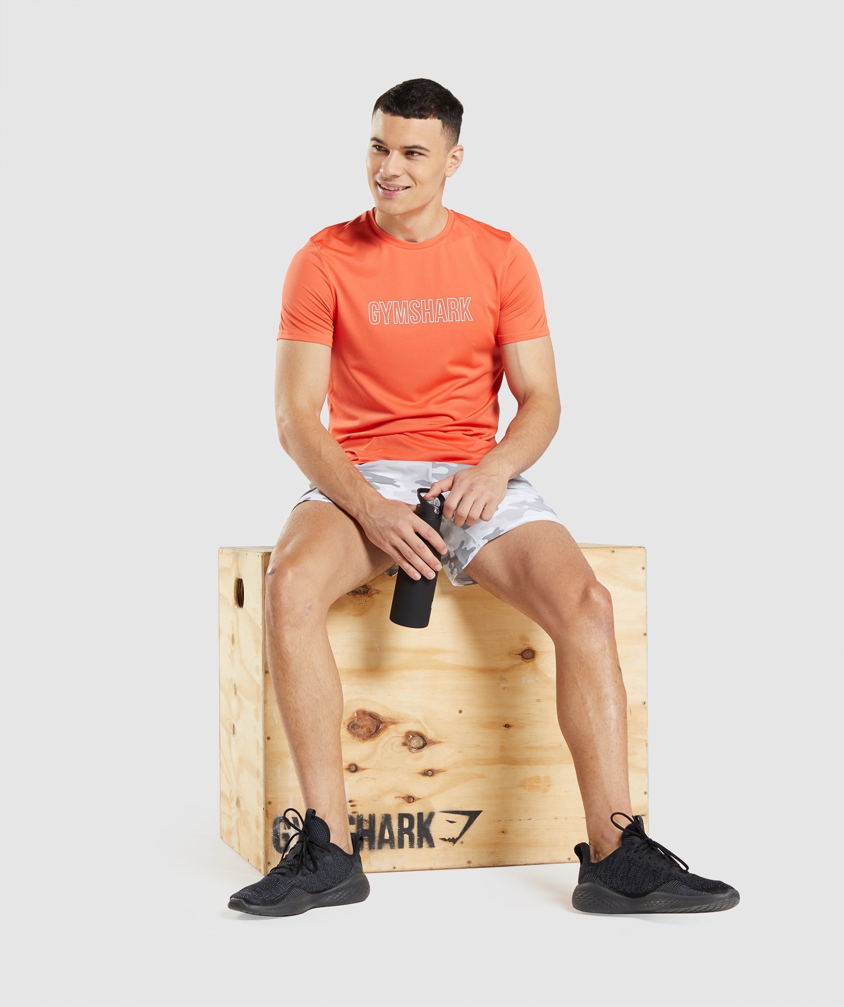 Camiseta Gymshark Arrival Estampadas Hombre Naranjas | 9253146-EM