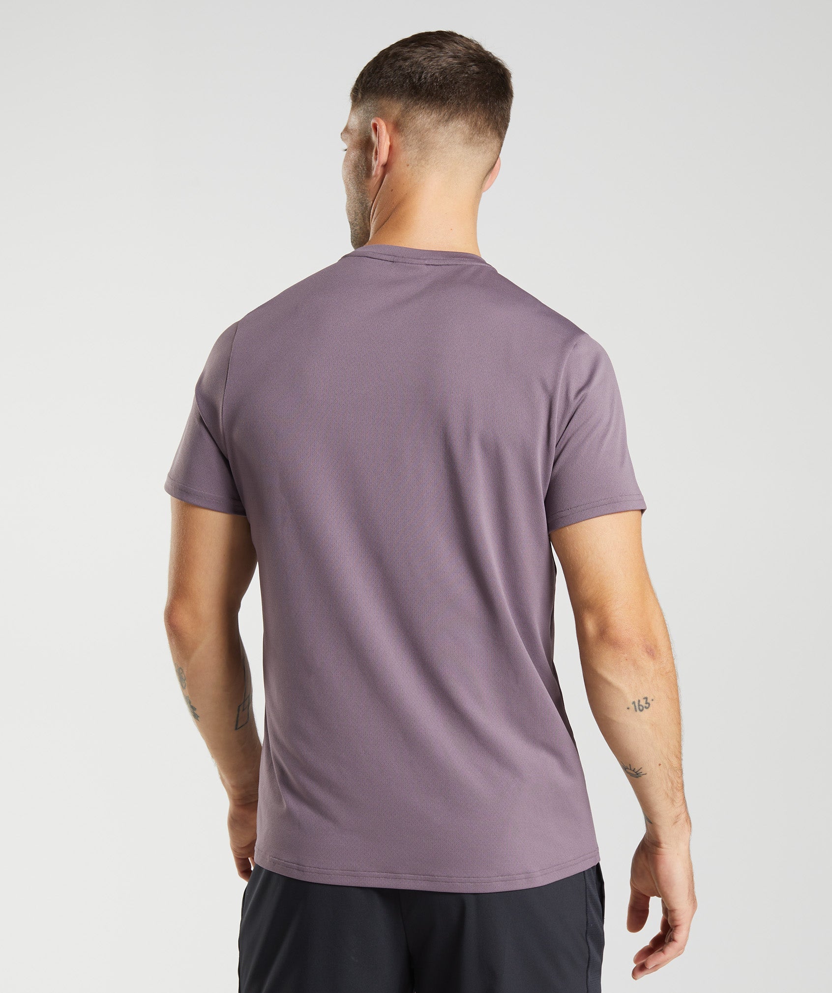 Camiseta Gymshark Arrival Hombre Moradas | 3789605-HS