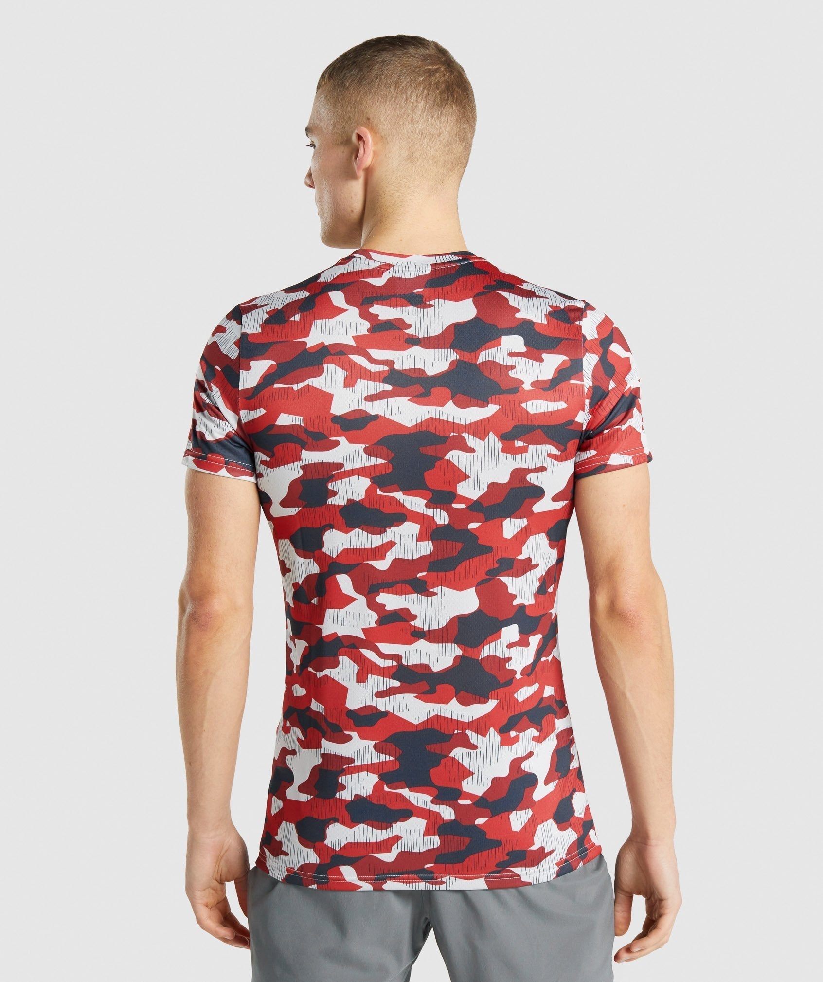 Camiseta Gymshark Arrival Hombre Rojas | 7560429-VG