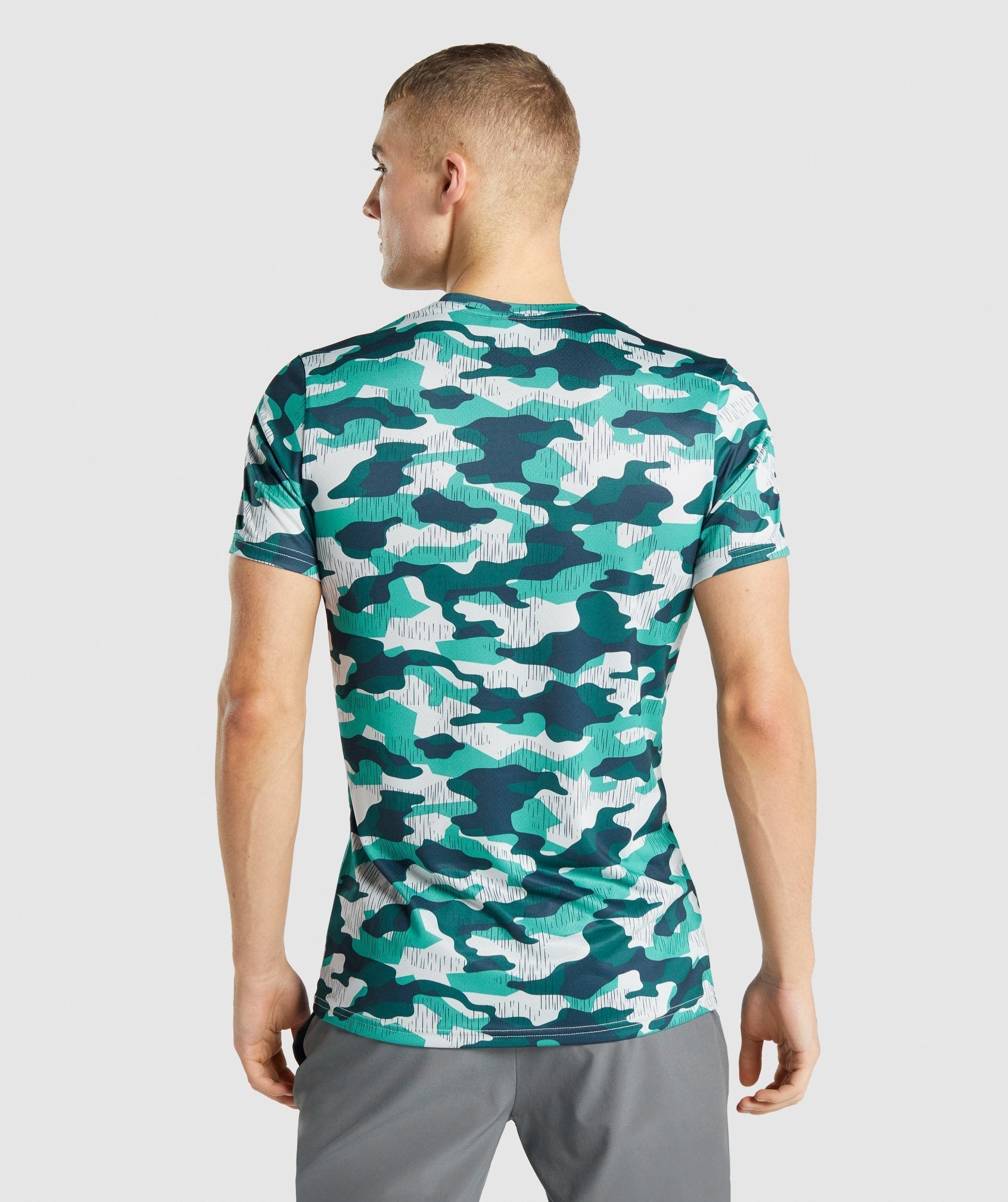 Camiseta Gymshark Arrival Hombre Turquesa | 7304589-UP