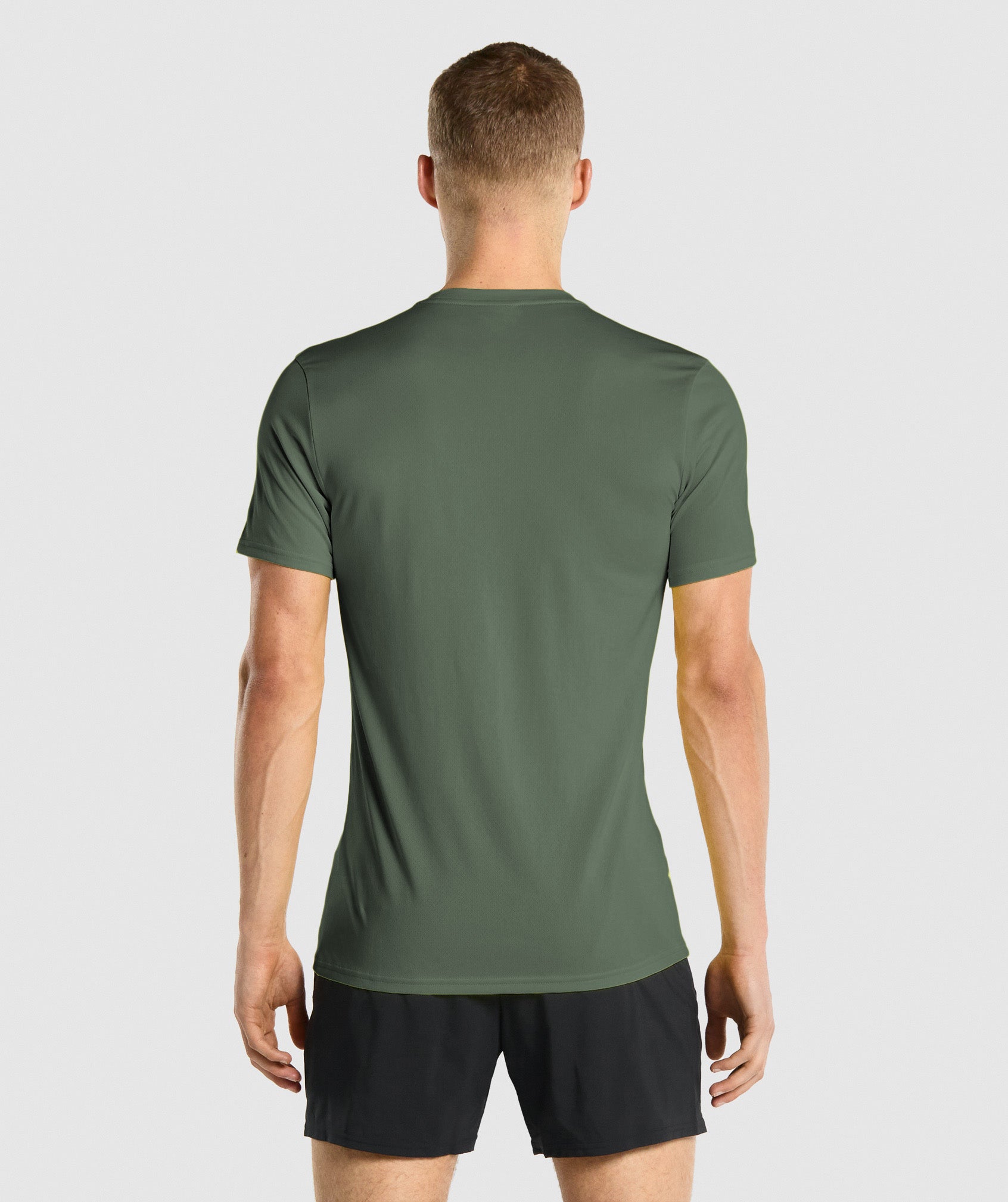 Camiseta Gymshark Arrival Hombre Verde | 6731408-OJ