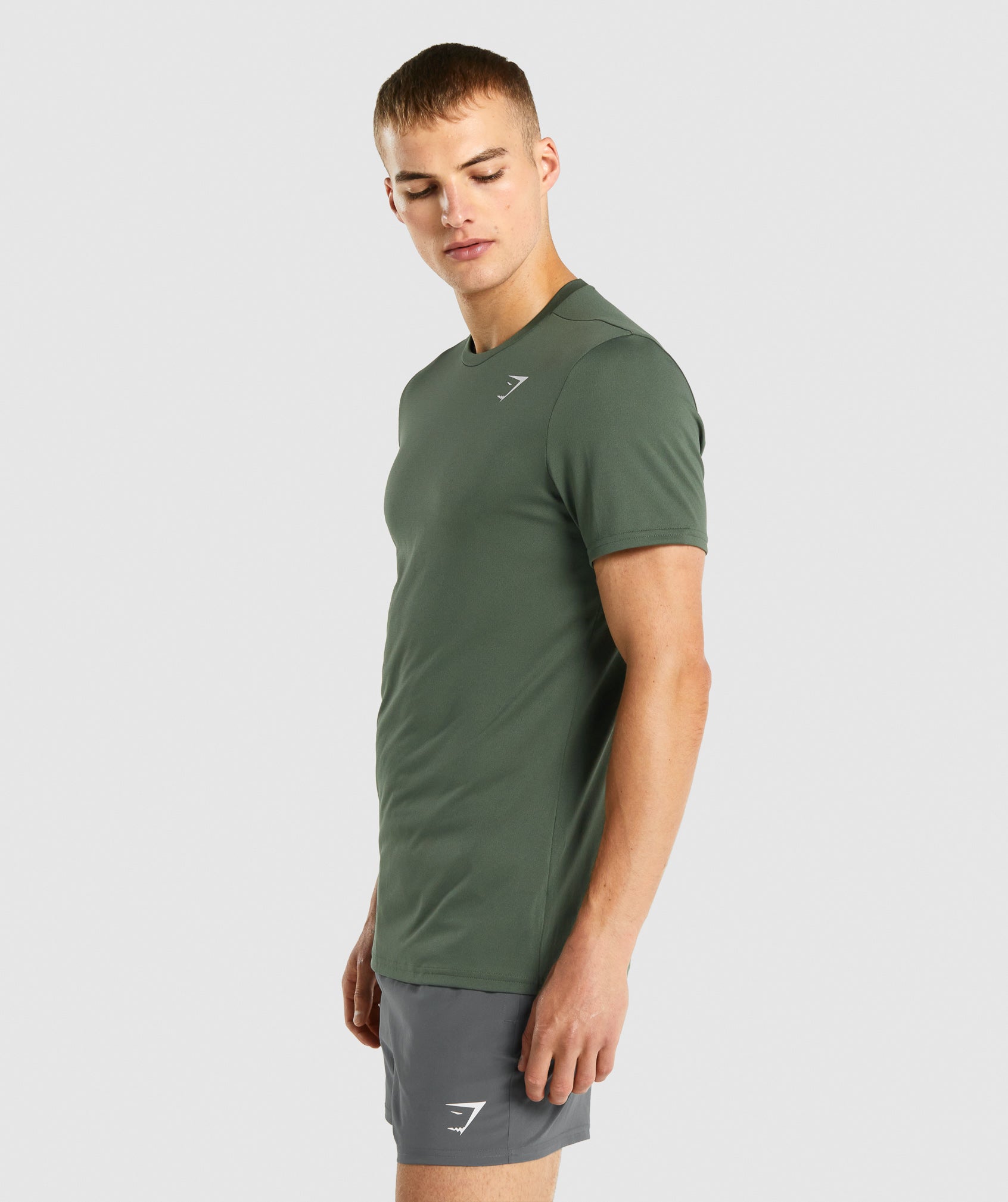 Camiseta Gymshark Arrival Hombre Verde | 6731408-OJ