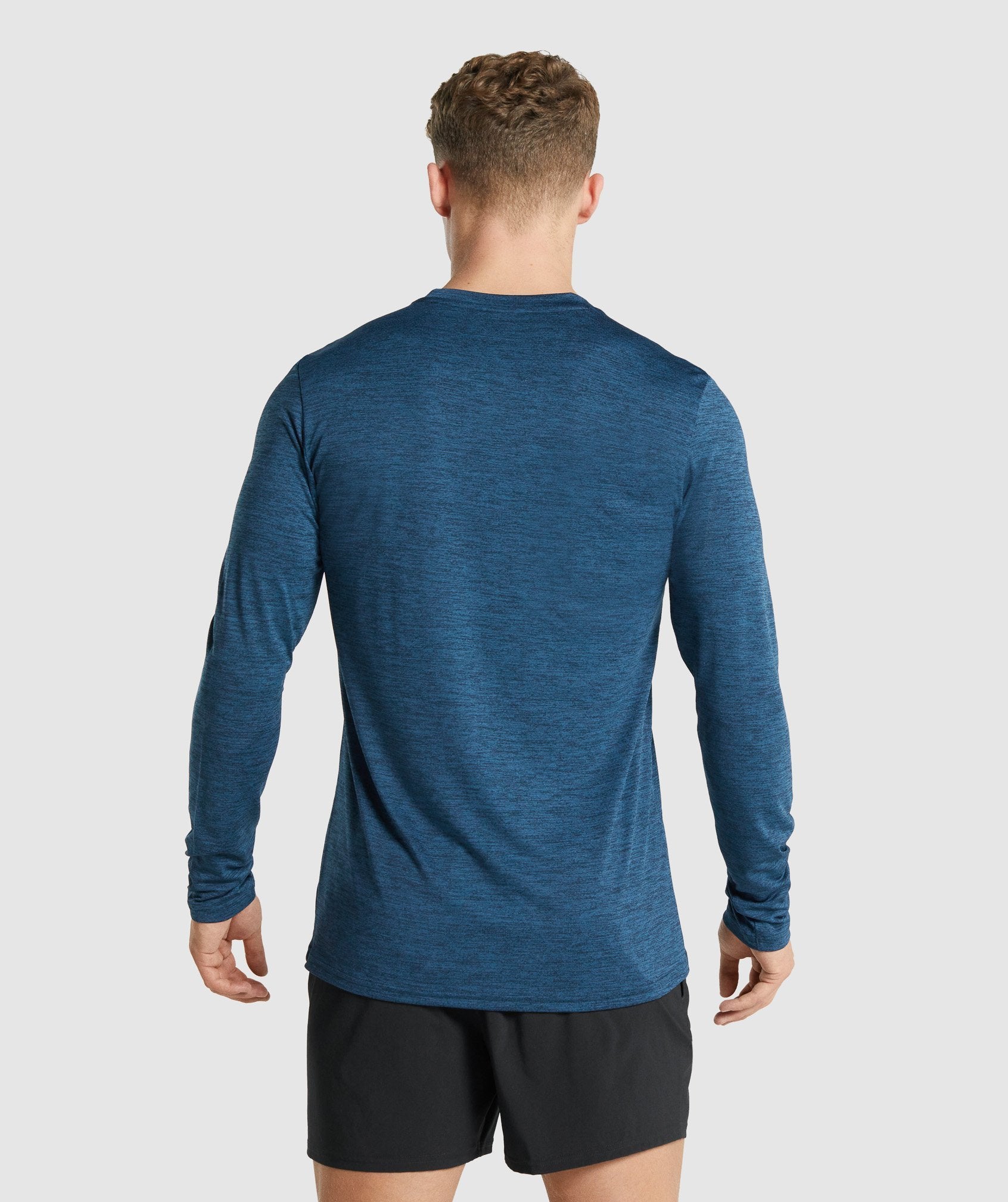 Camiseta Gymshark Arrival Marl Long Sleeve Hombre Azul Marino | 7062138-IV