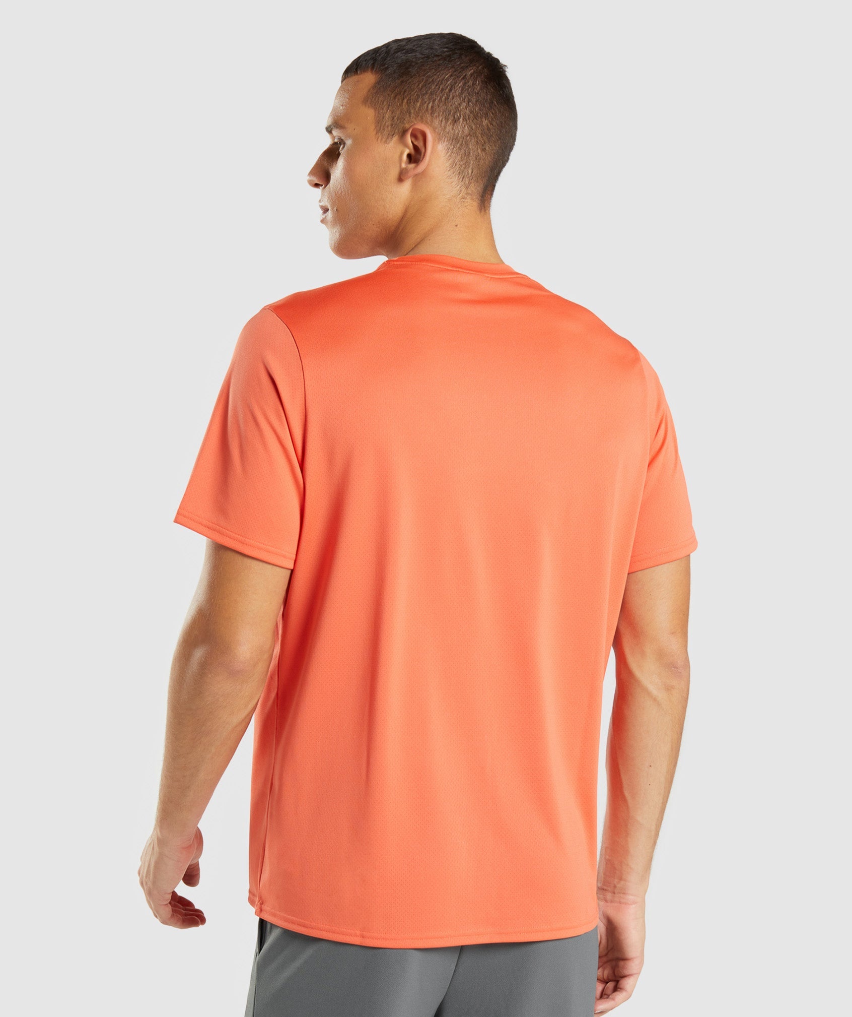 Camiseta Gymshark Arrival Regular Fit Hombre Naranjas | 2958346-LH