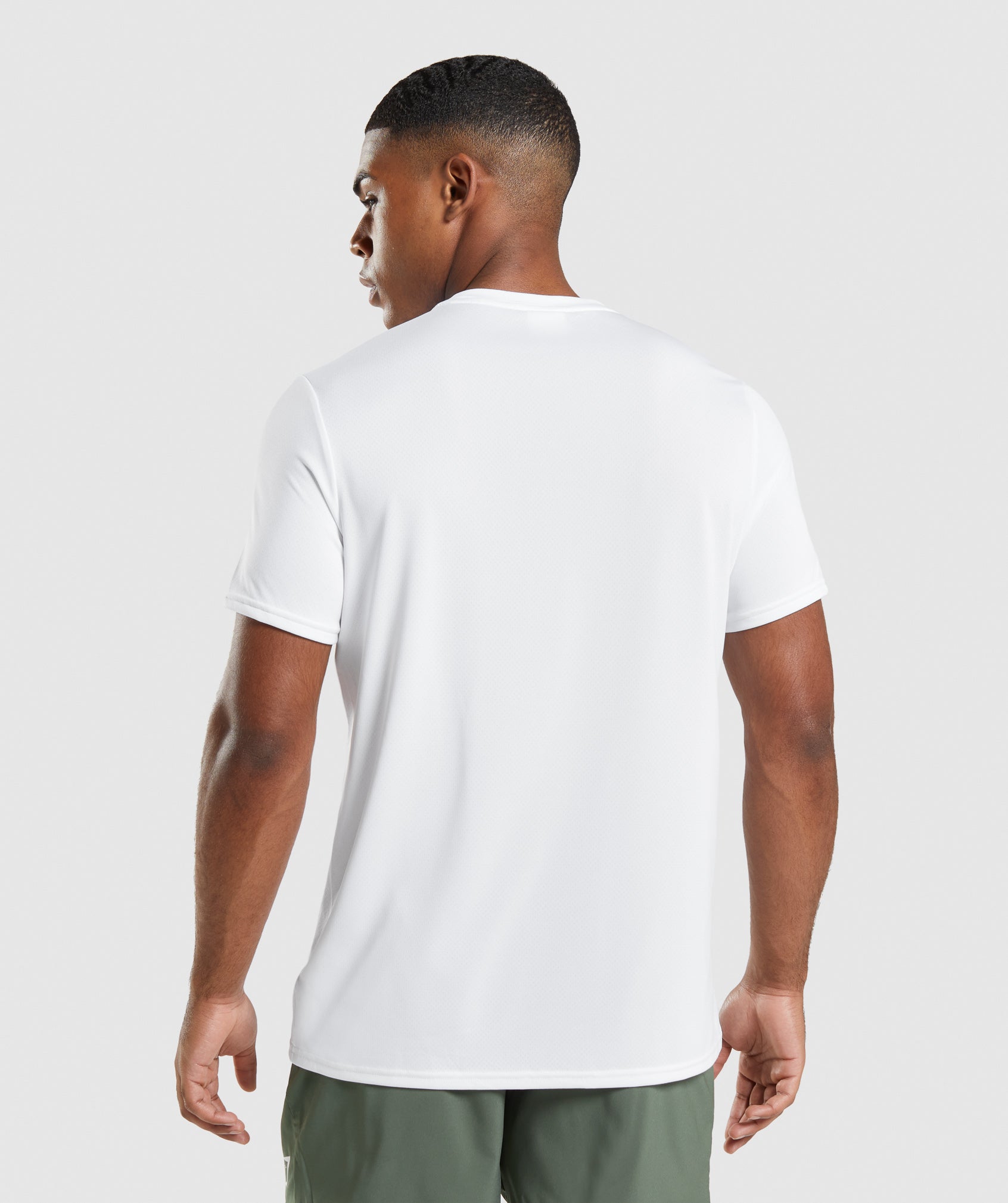 Camiseta Gymshark Arrival Regular Fit Hombre Blancas | 3241690-BI