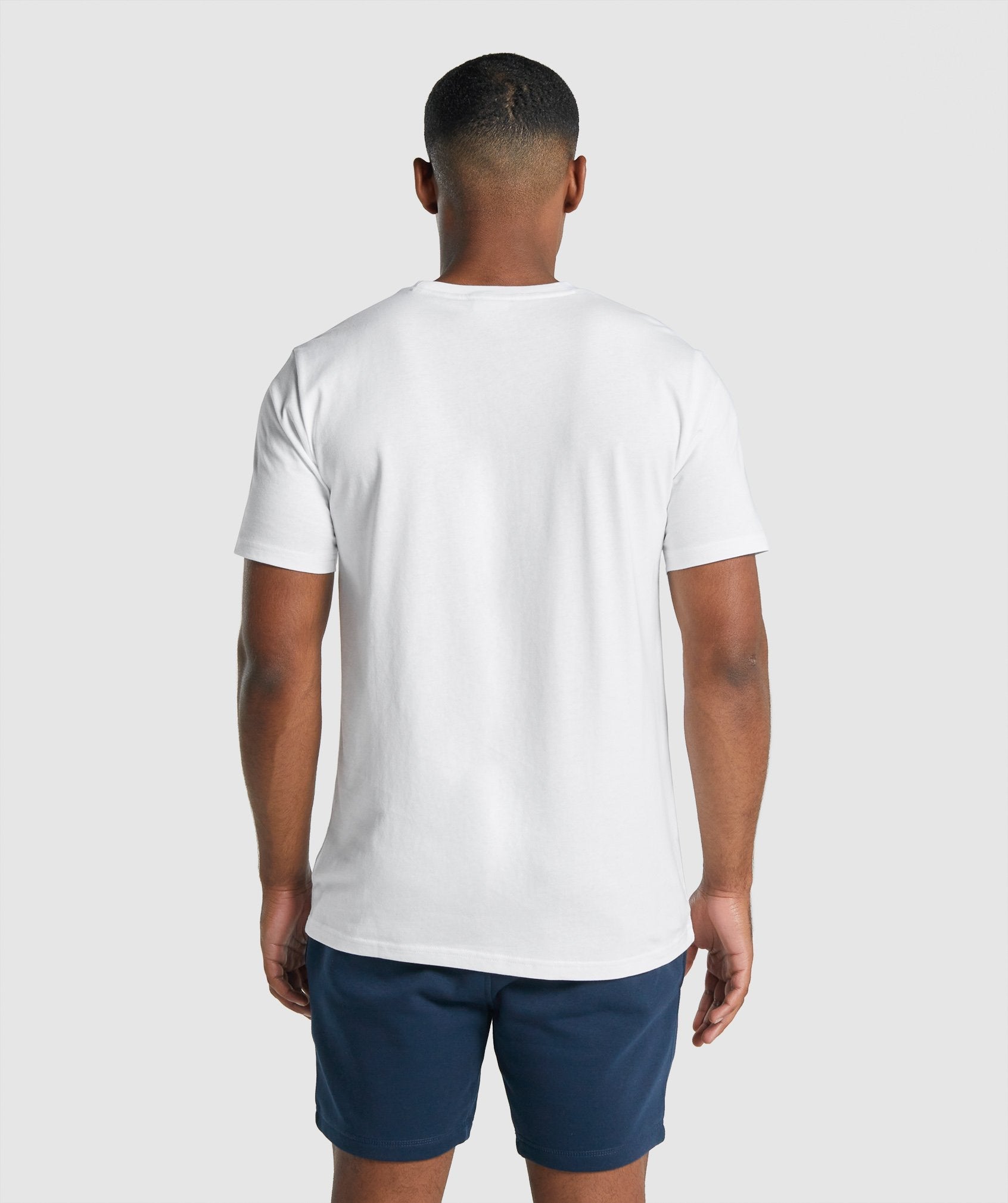 Camiseta Gymshark Crest Hombre Blancas | 8320976-RK