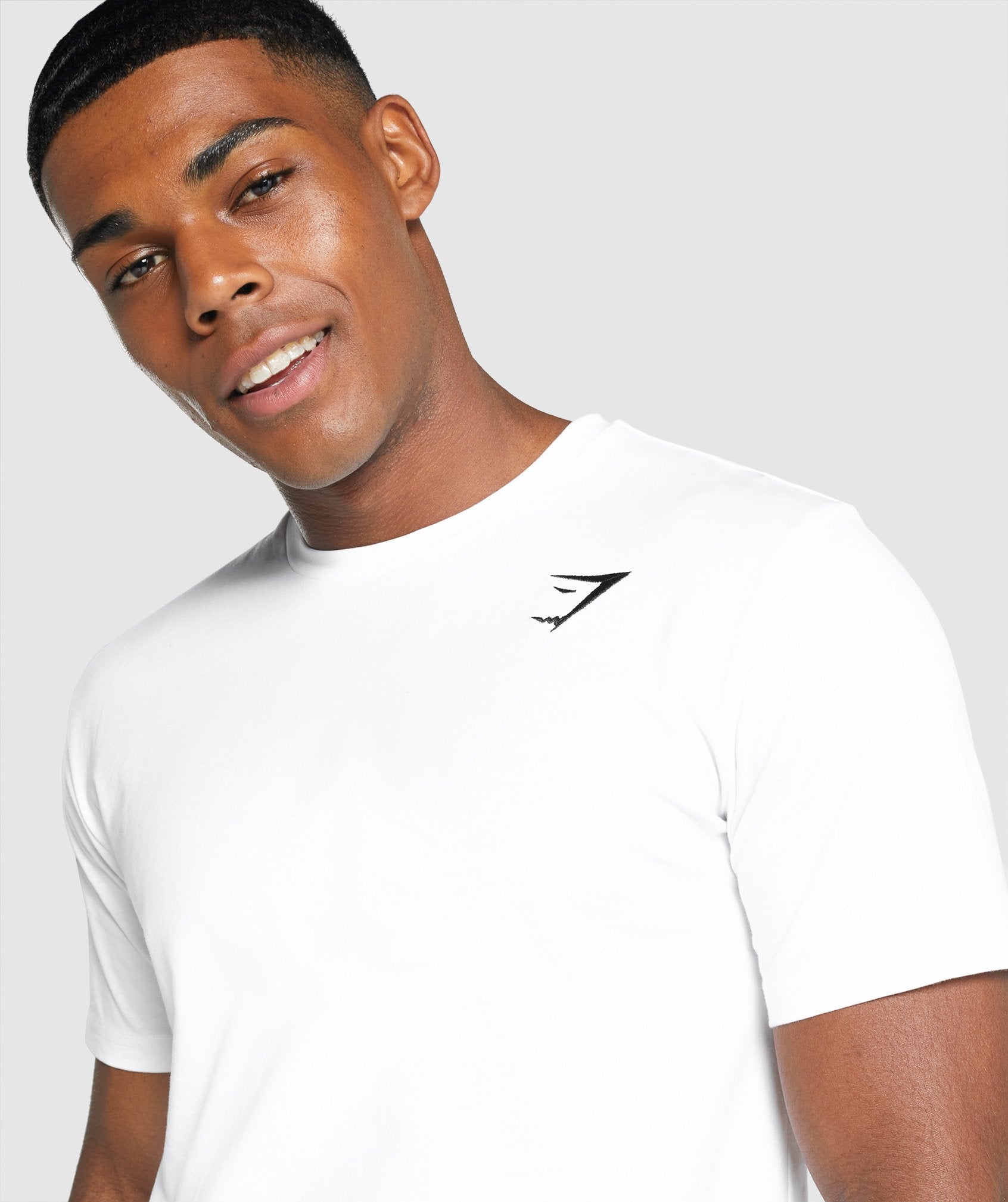 Camiseta Gymshark Crest Hombre Blancas | 8320976-RK