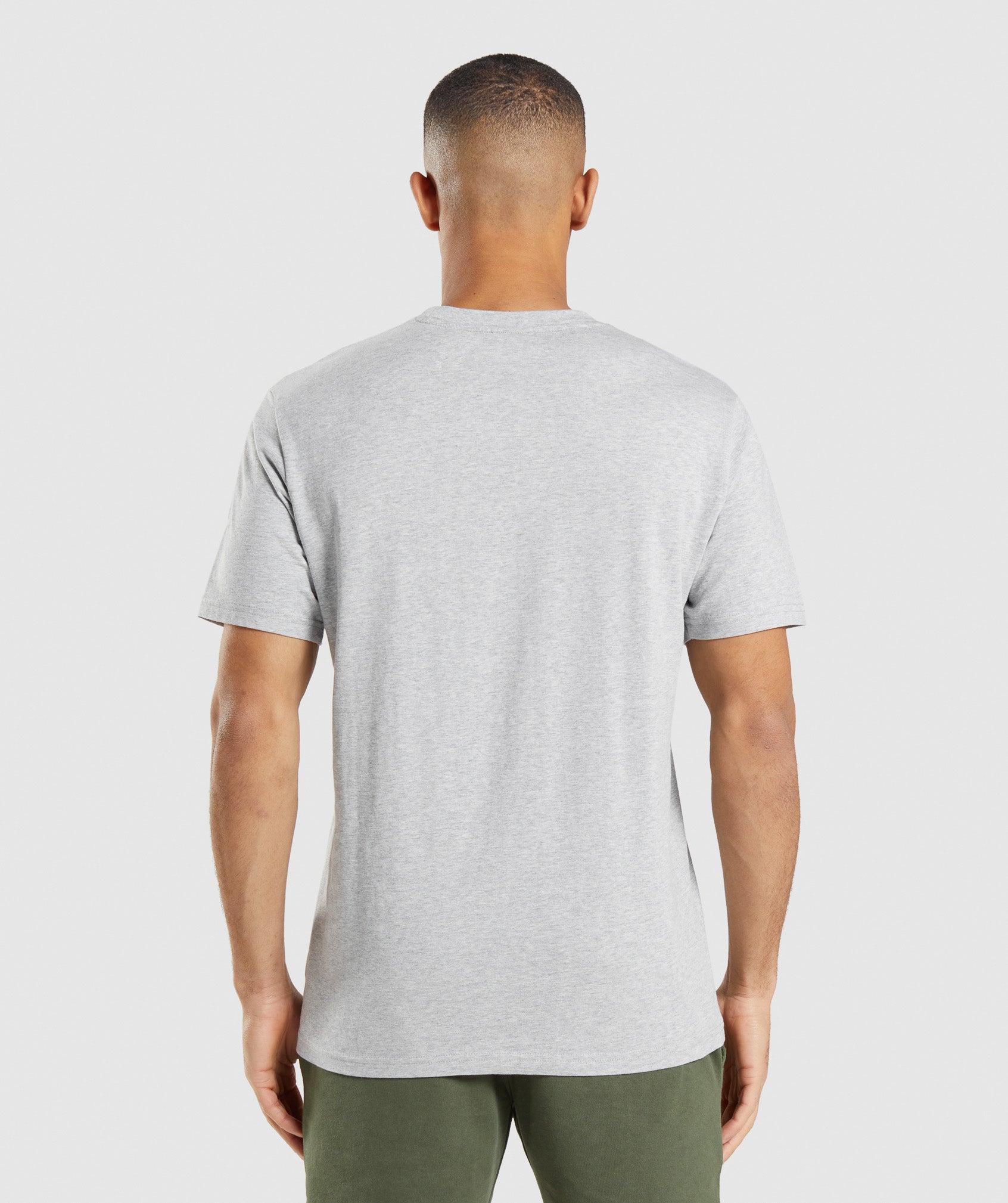 Camiseta Gymshark Crest Hombre Gris Claro | 0273469-EZ