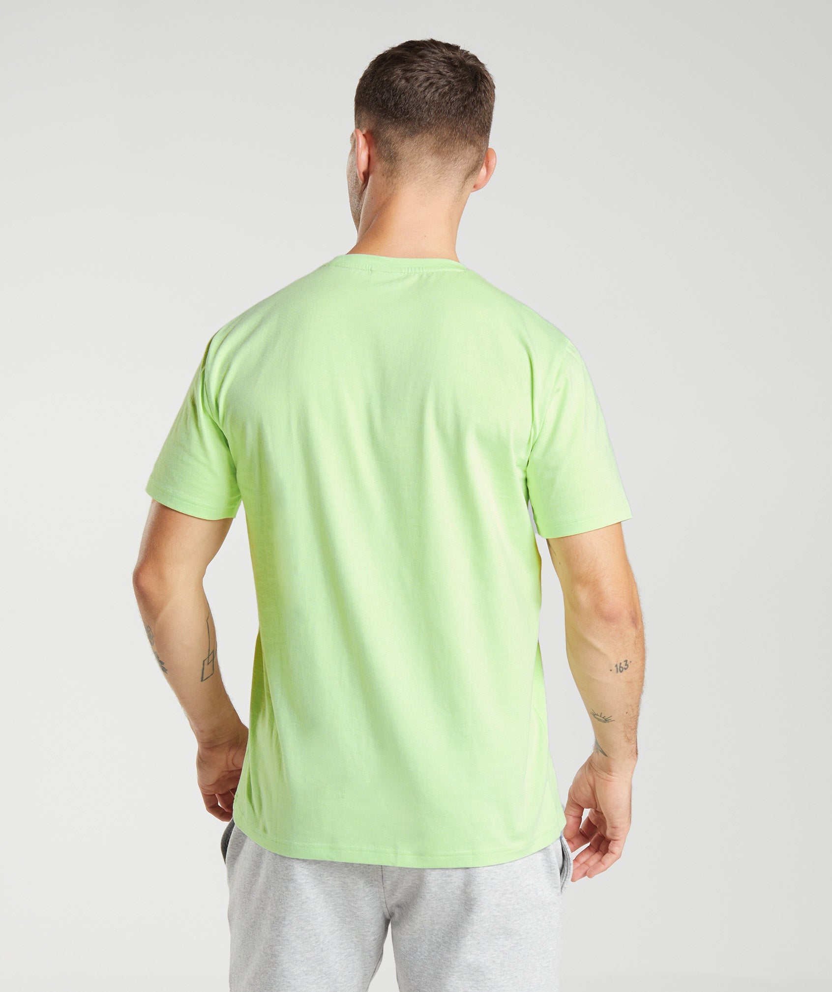 Camiseta Gymshark Crest Hombre Verde | 6172904-PR