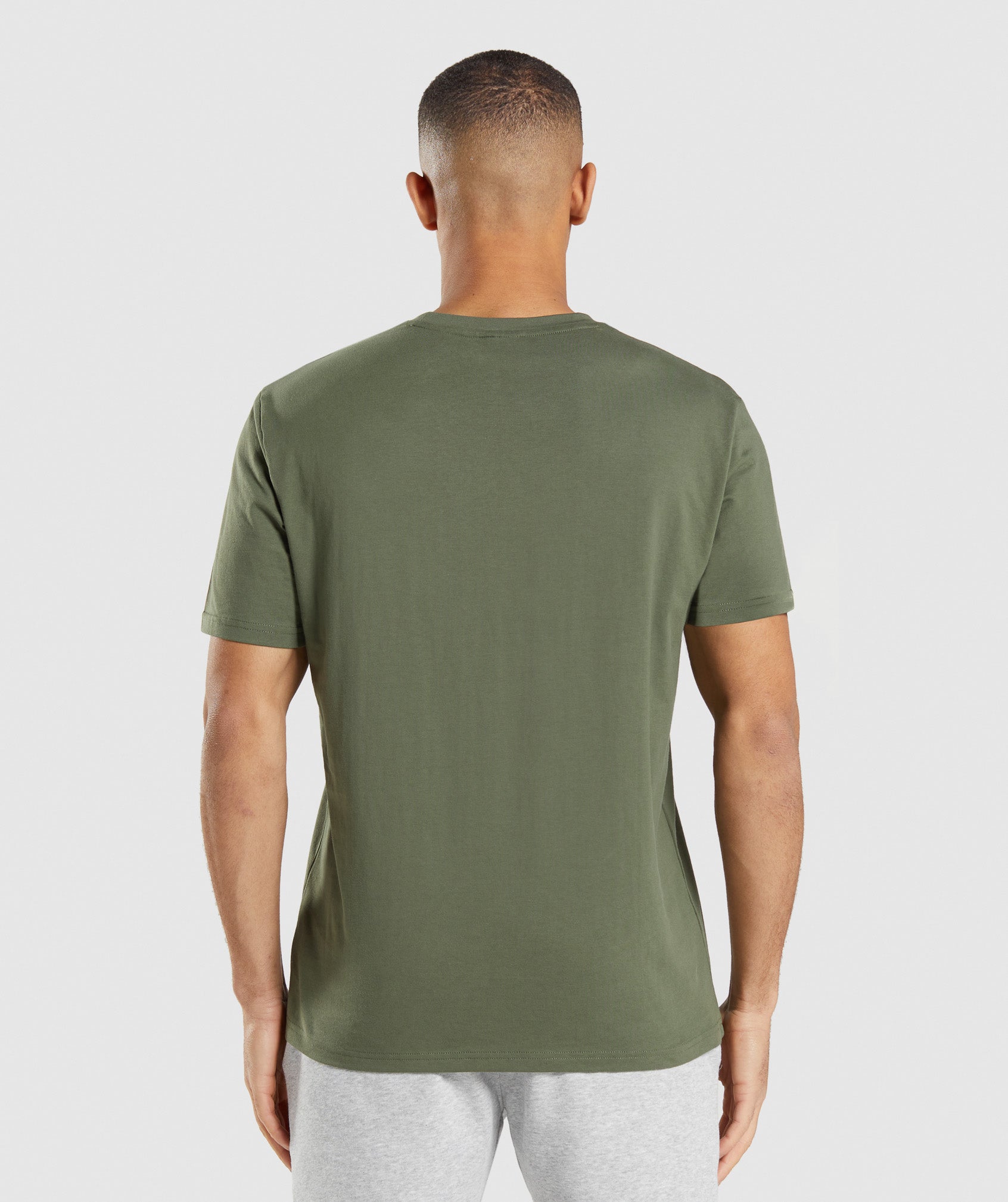 Camiseta Gymshark Crest Hombre Verde Oliva | 5098234-NL