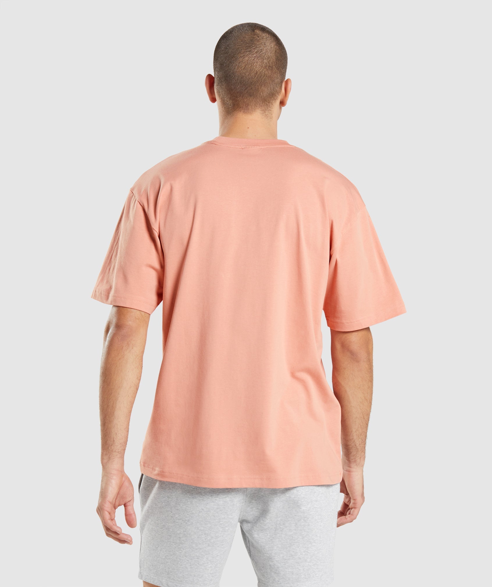 Camiseta Gymshark Essential Oversized Hombre Rosas | 8401297-DX