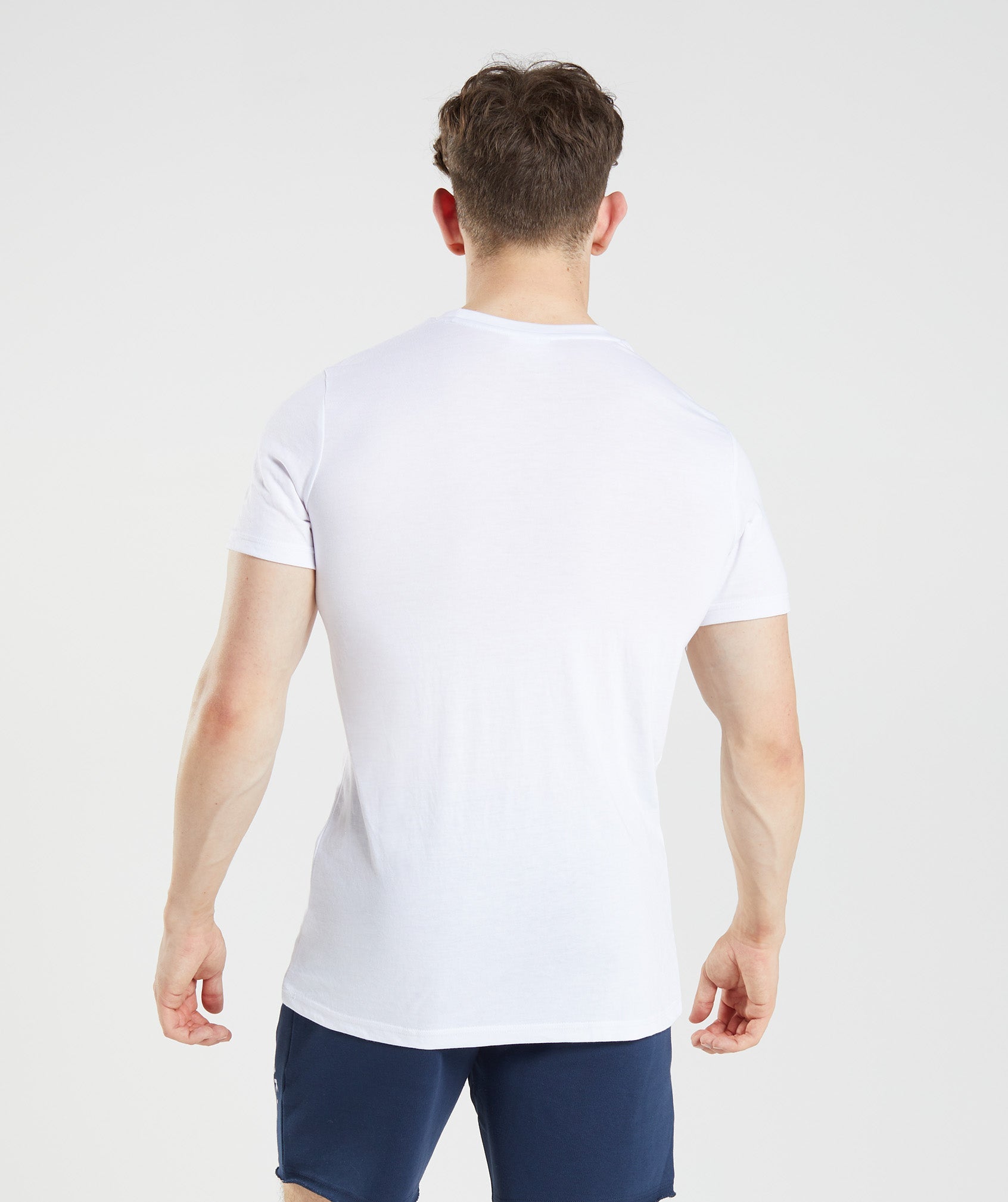 Camiseta Gymshark Legacy Hombre Blancas | 9756104-ZA