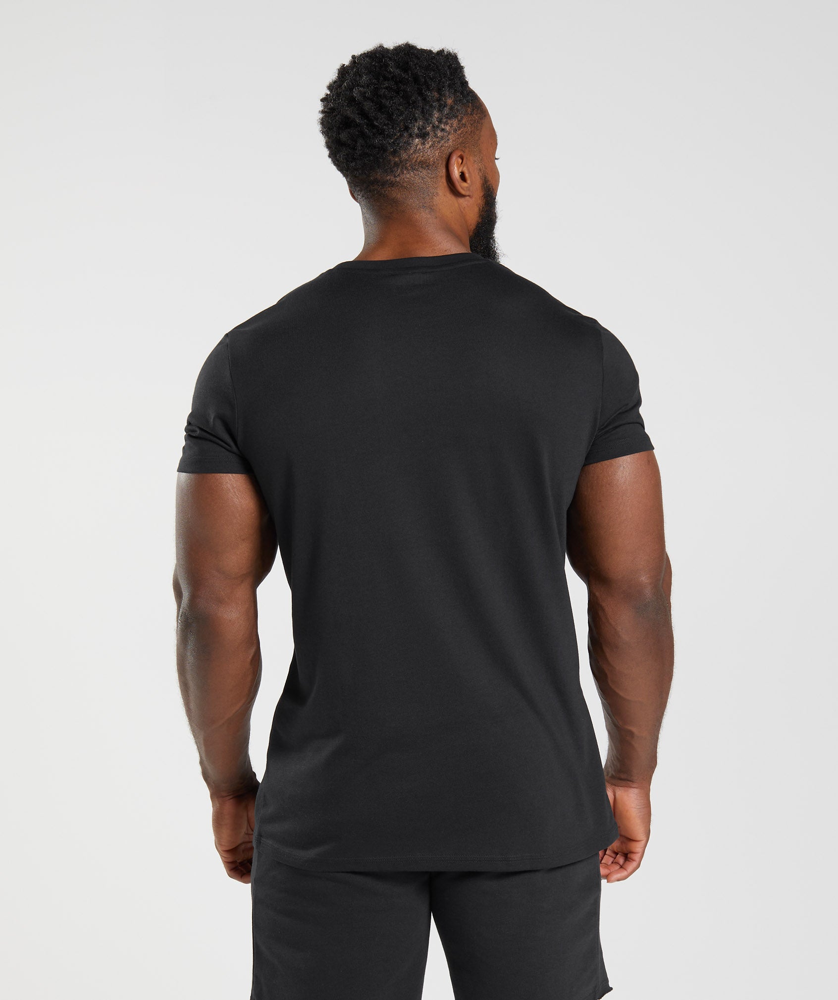 Camiseta Gymshark Legacy Hombre Negras | 7924015-ED