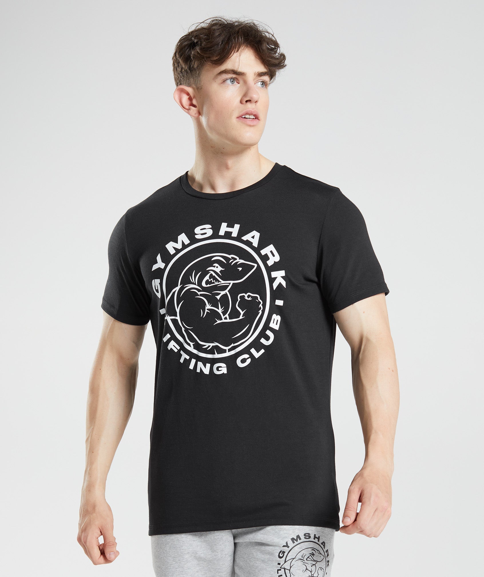 Camiseta Gymshark Legacy Hombre Negras | 8950327-BR