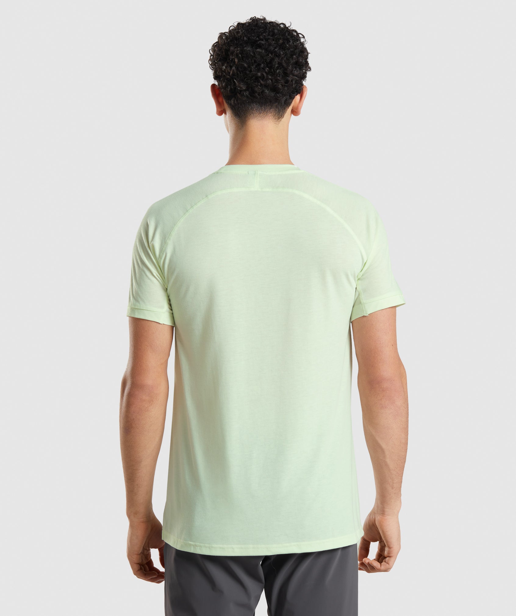 Camiseta Gymshark Studio Amplify Hombre Verde | 7641835-ZW