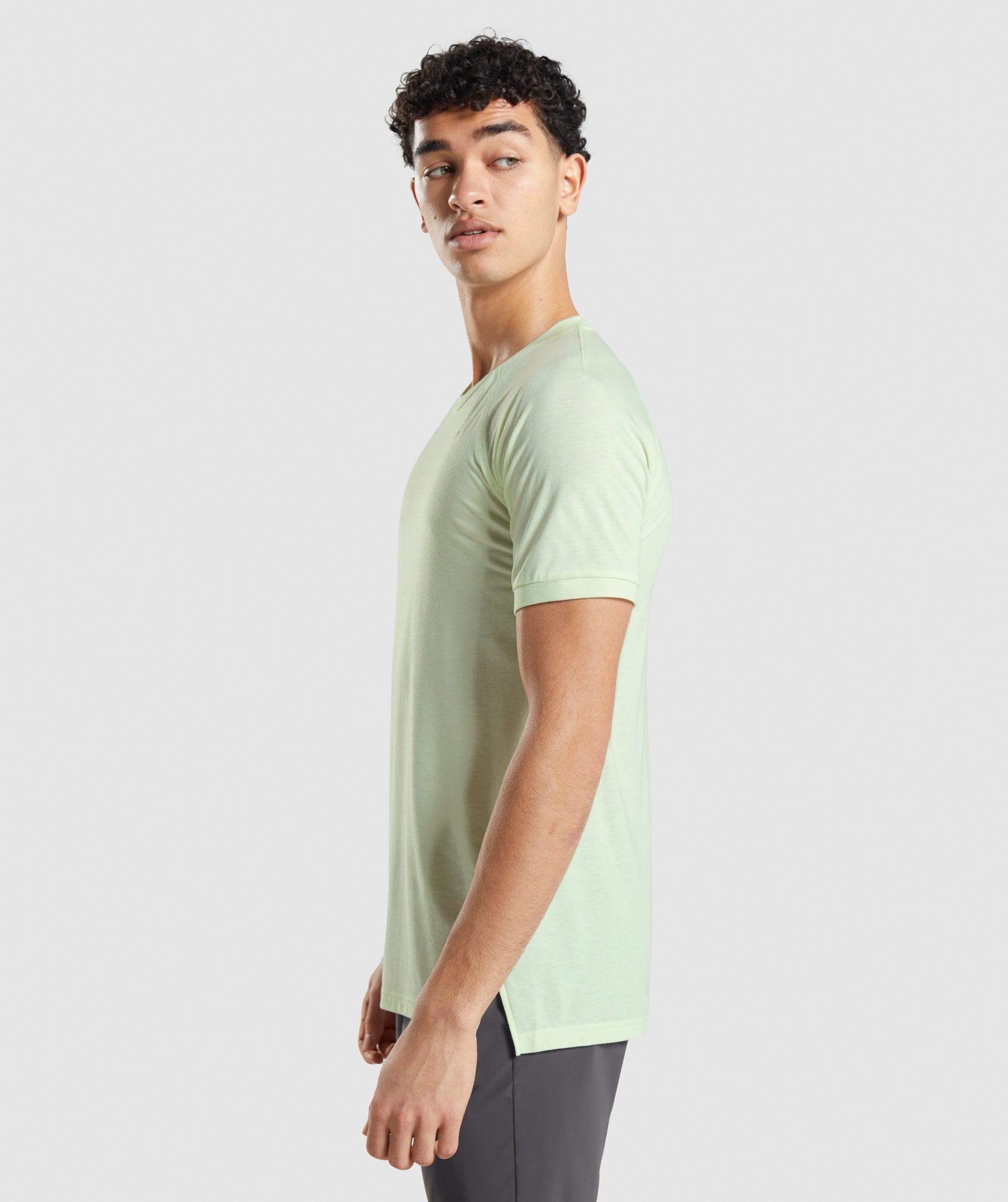 Camiseta Gymshark Studio Amplify Hombre Verde | 7641835-ZW