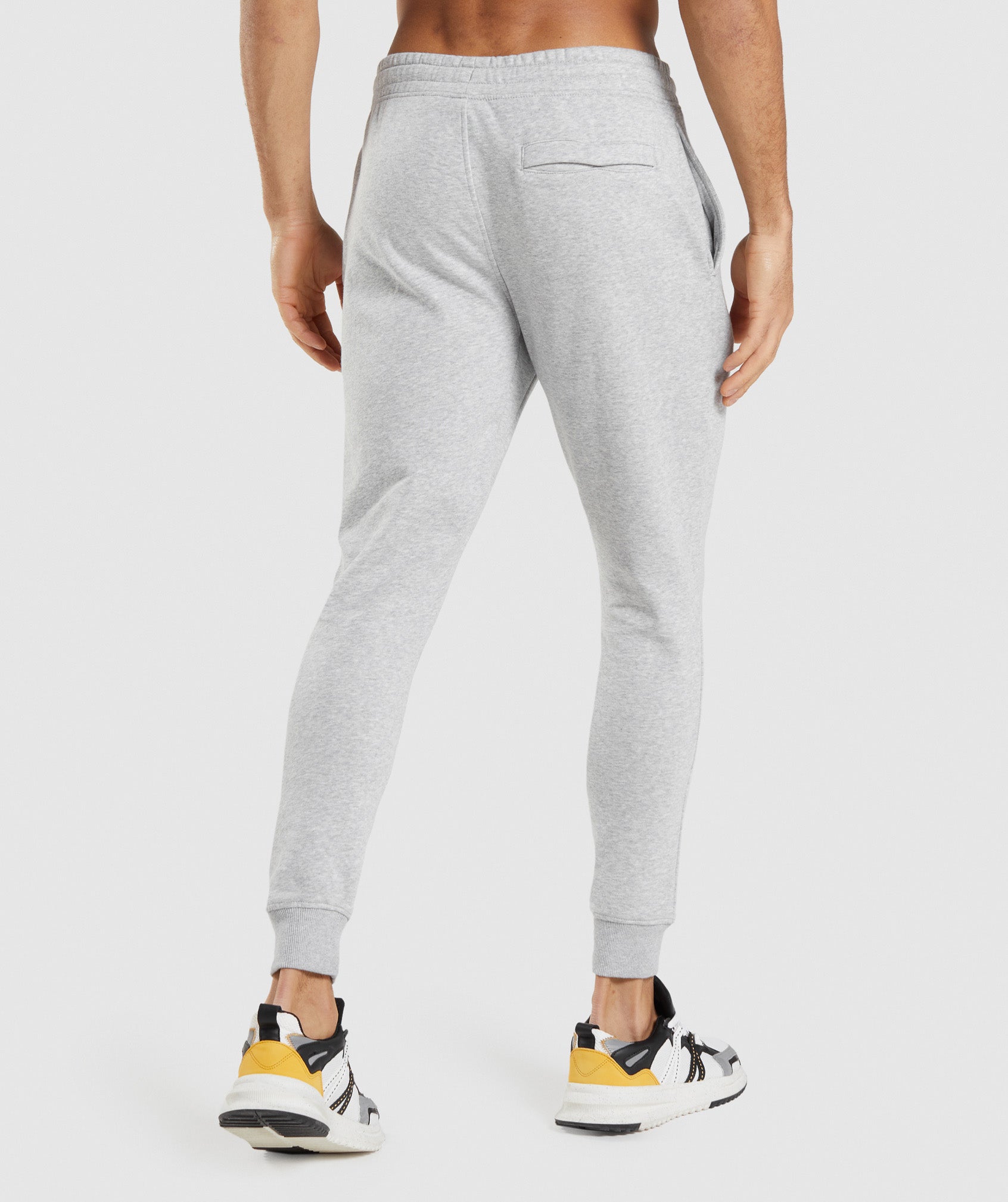 Pantalones Jogger Gymshark Crest Hombre Gris Claro | 9684320-YW