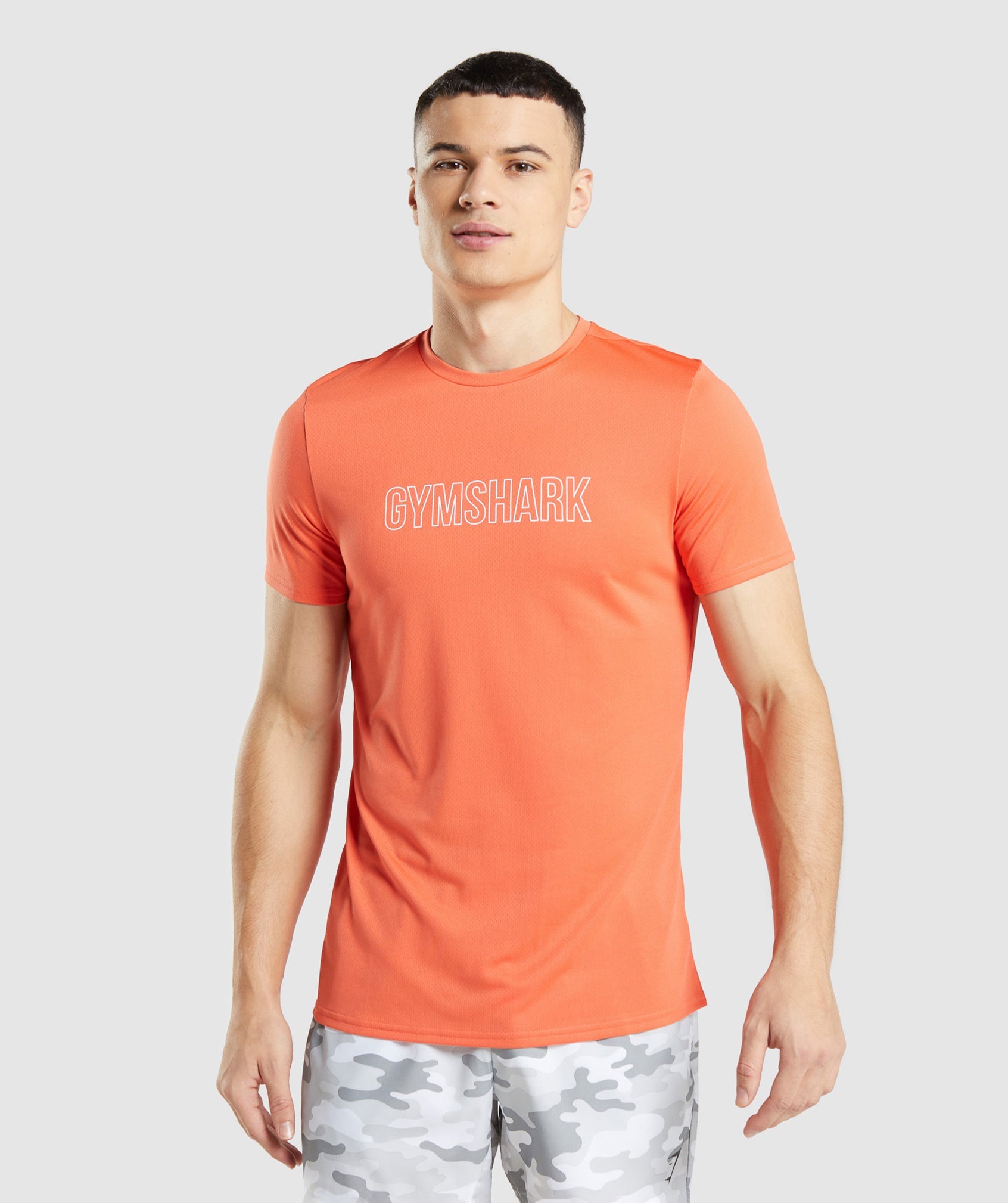 Camiseta Gymshark Arrival Estampadas Hombre Naranjas | 9253146-EM