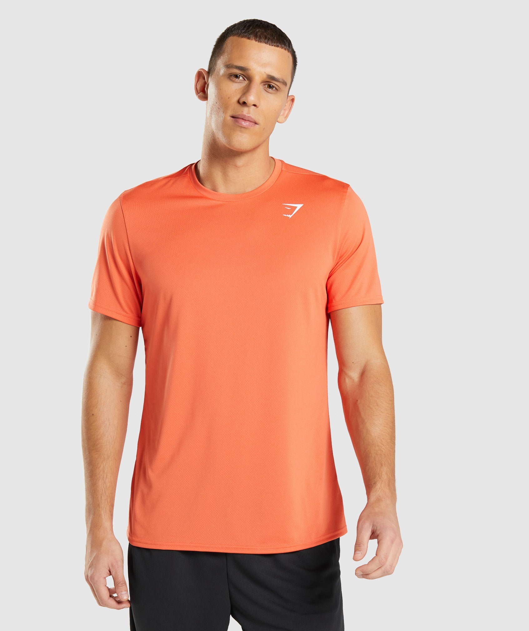 Camiseta Gymshark Arrival Hombre Naranjas | 8241709-RY