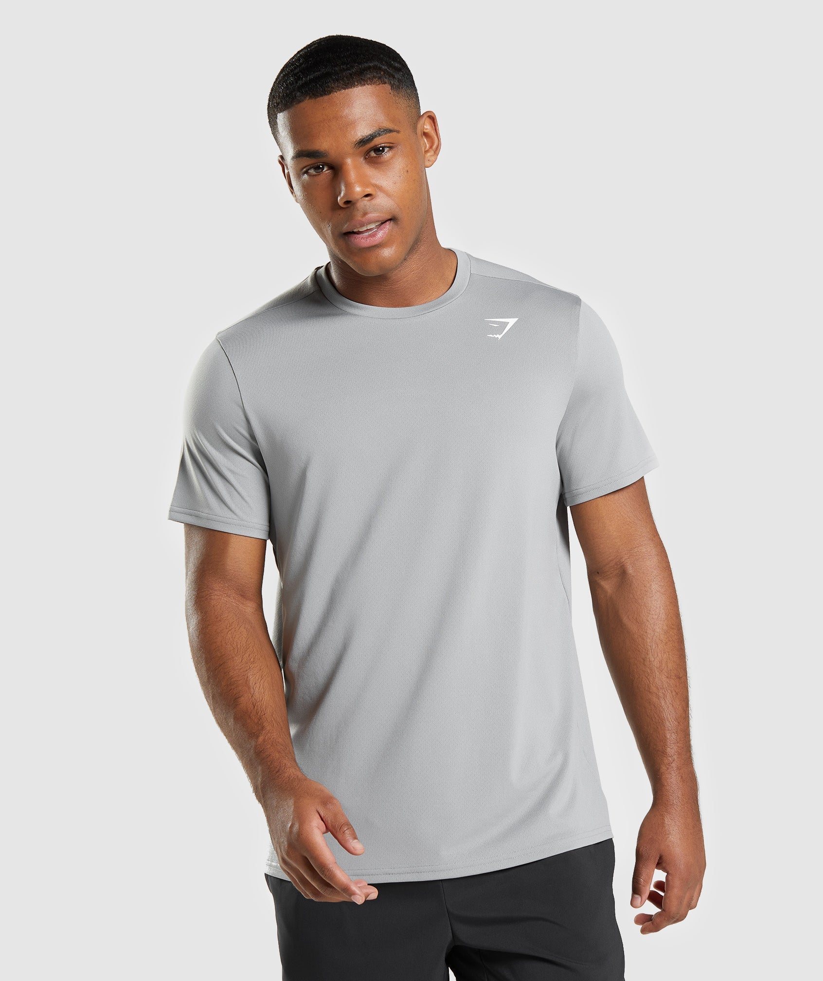 Camiseta Gymshark Arrival Regular Fit Hombre Gris | 6410387-FW