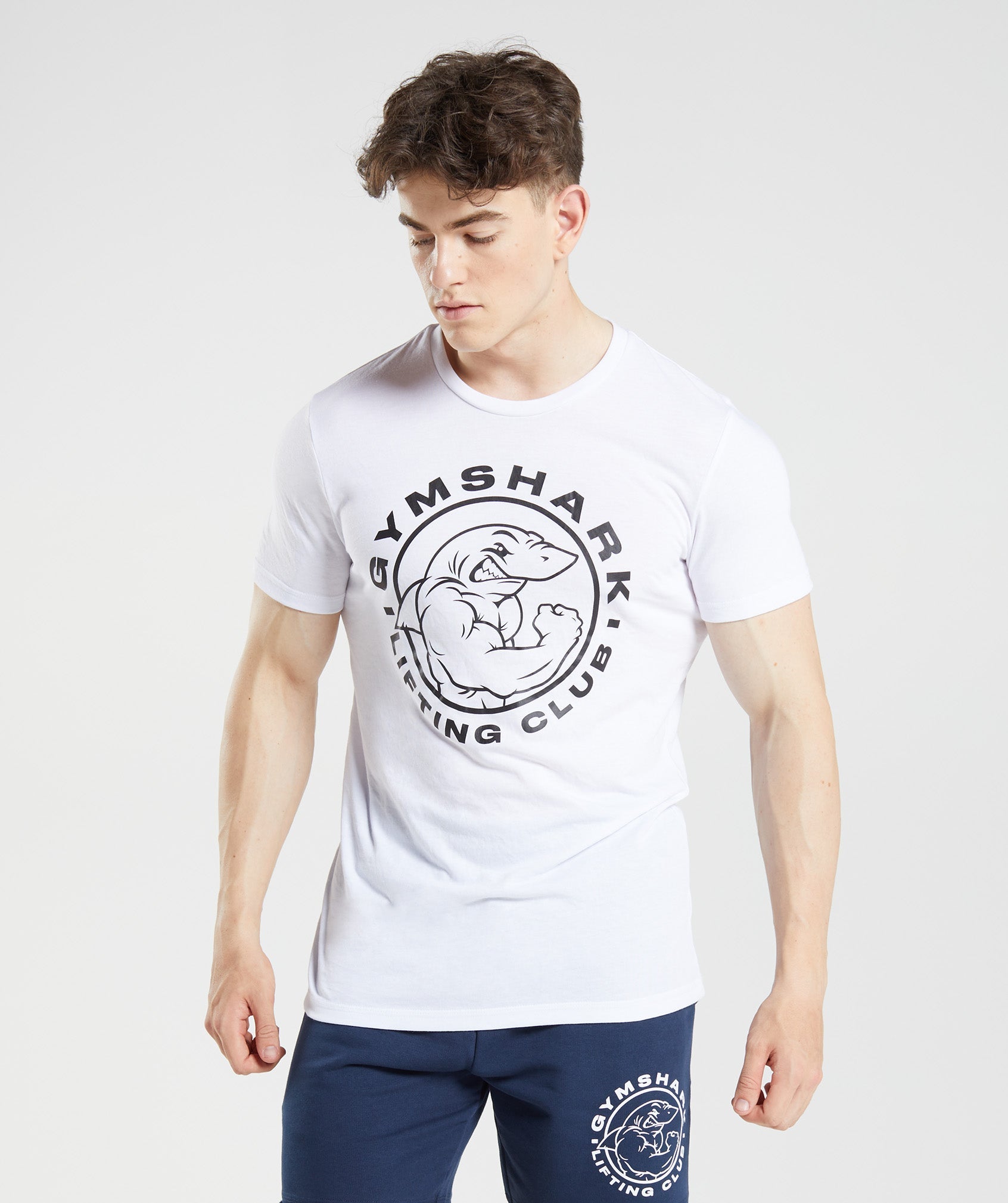 Camiseta Gymshark Legacy Hombre Blancas | 9756104-ZA