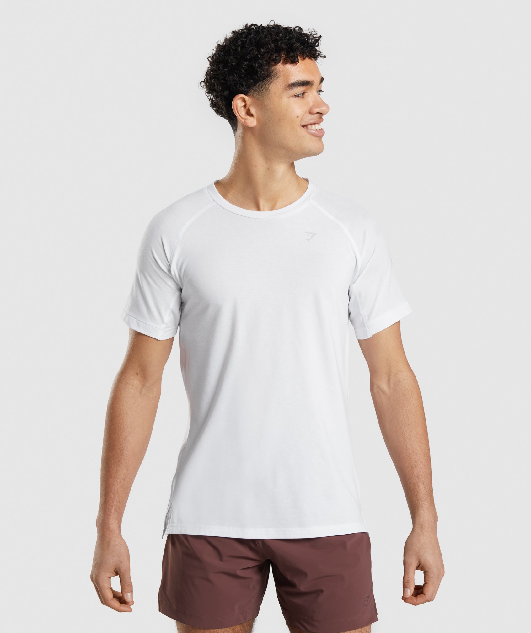 Camiseta Gymshark Studio Amplify Hombre Blancas | 6021358-YZ