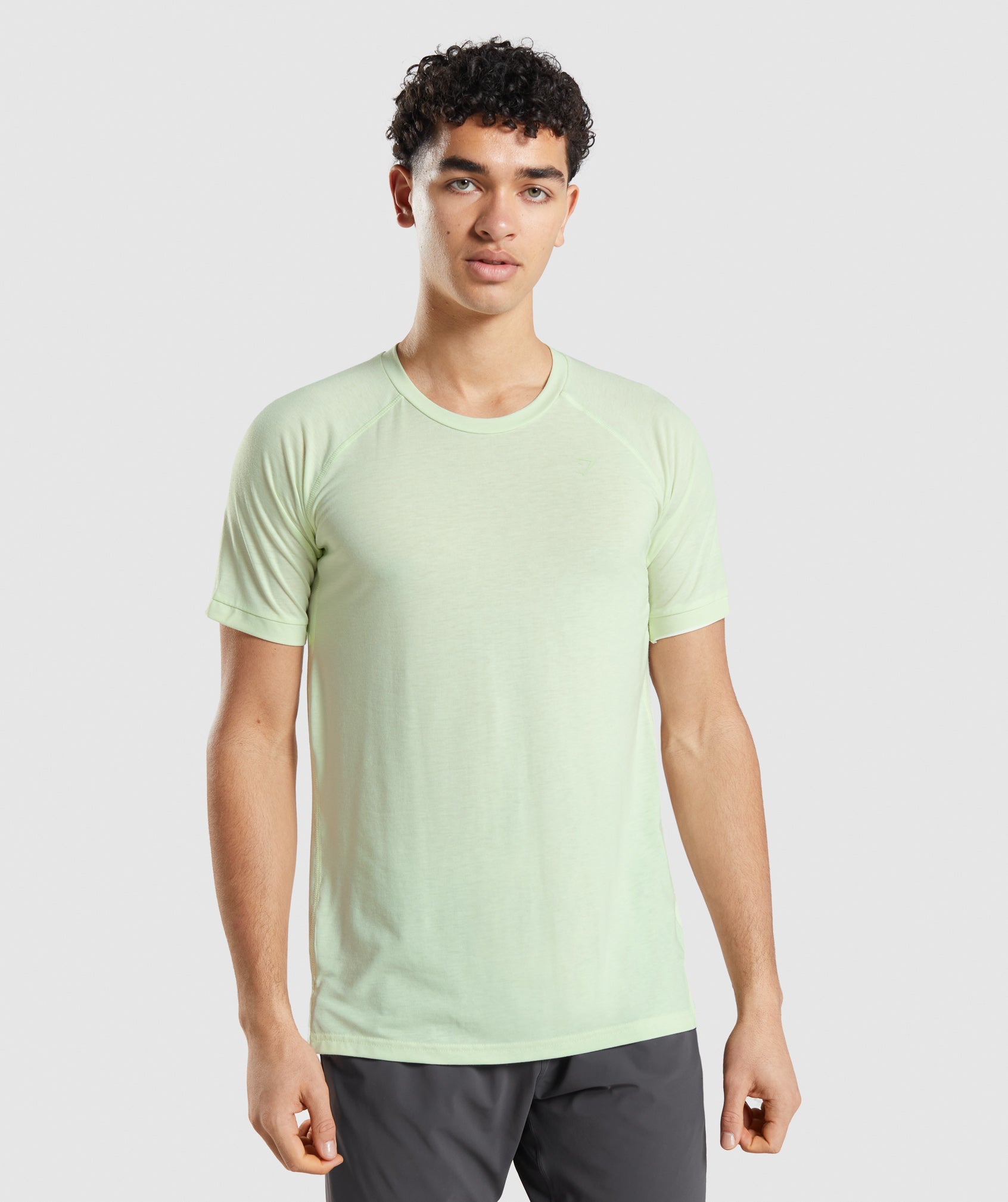 Camiseta Gymshark Studio Amplify Hombre Verde | 7641835-ZW